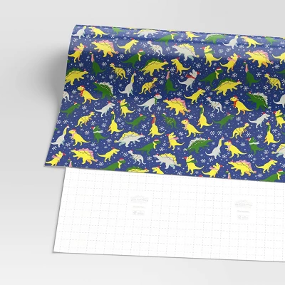 30” 125 Sq Ft Christmas Roll Wrap Dinosaurs On Blue - Wondershop™ 4 30” 125 Sq Ft Christmas Roll Wrap Dinosaurs On Blue - Wondershop™ - Image 2