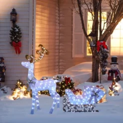 LuxenHome 2-Piece White Reindeer And Sleigh With Silver Bow And Ornaments Outdoor Holiday Decoration With Lights White, Multi, Silver, Brown -Northlight Shop GUEST d2772003 aee7 474a aa62 e9ee86a5a332
